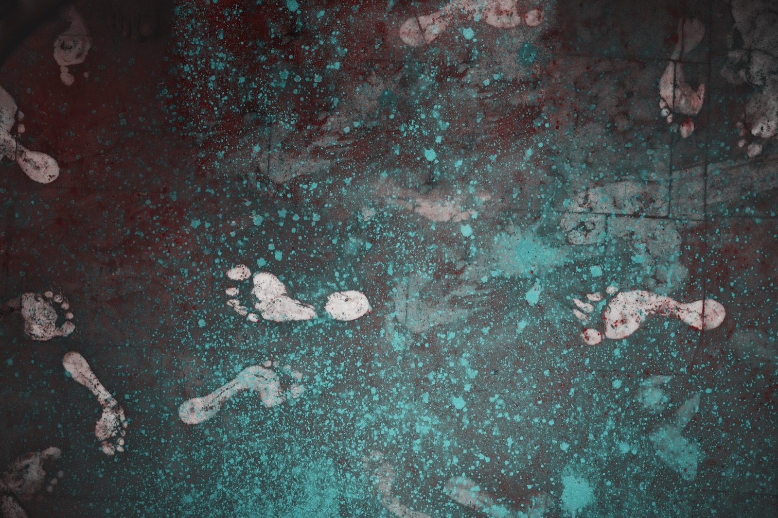 Bare footprints left in blue, red and green Holi powder on a temple floor in India — fine art photograph by Sefa Yamak, India series.